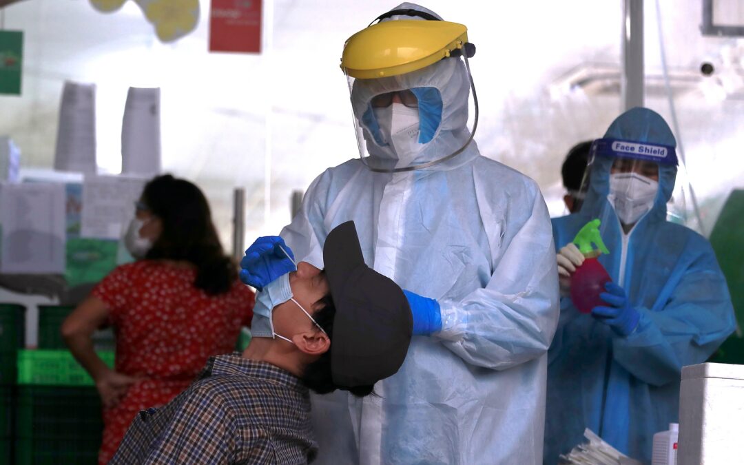 Vietnam’s health minister arrested over COVID test gouging