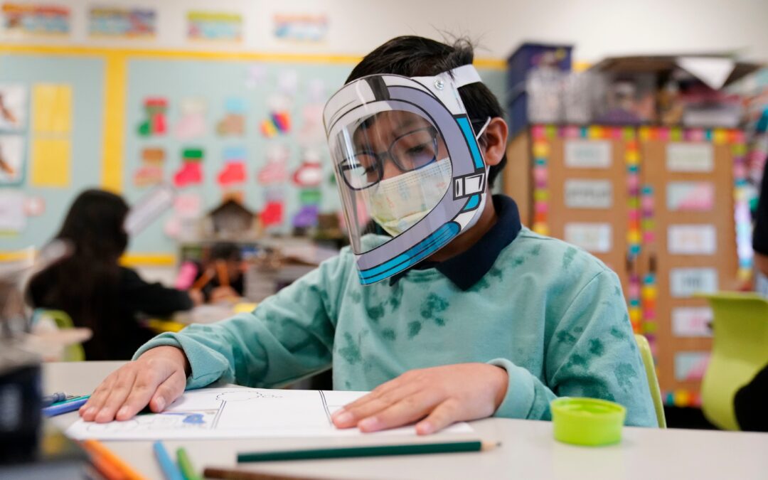 Some schools hit hard by virus make few changes for new year